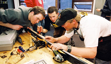 Picture of students earning their Ski and Snowboard Shop Technician Certificate at CMC.